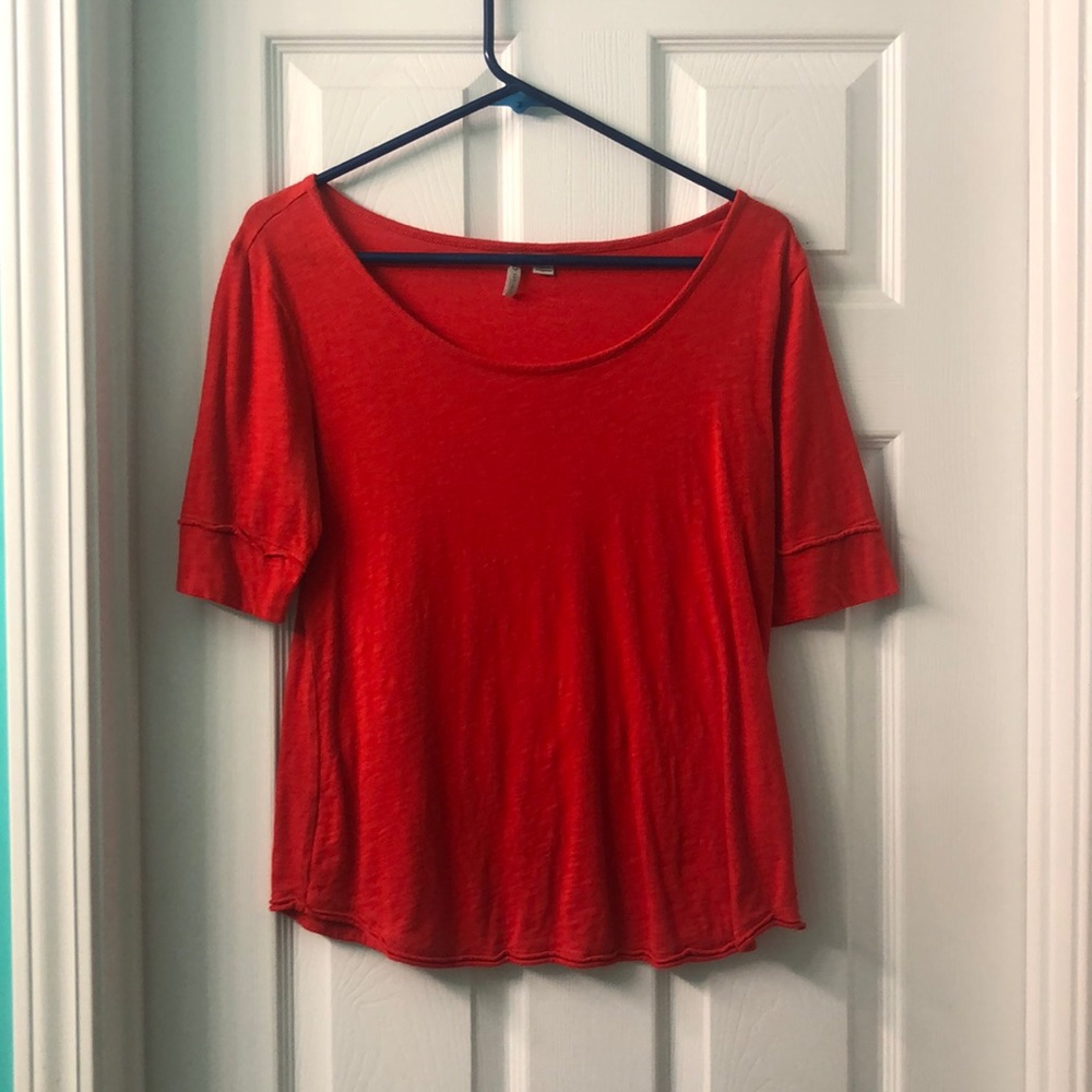Bright orange elbow sleeve shirt